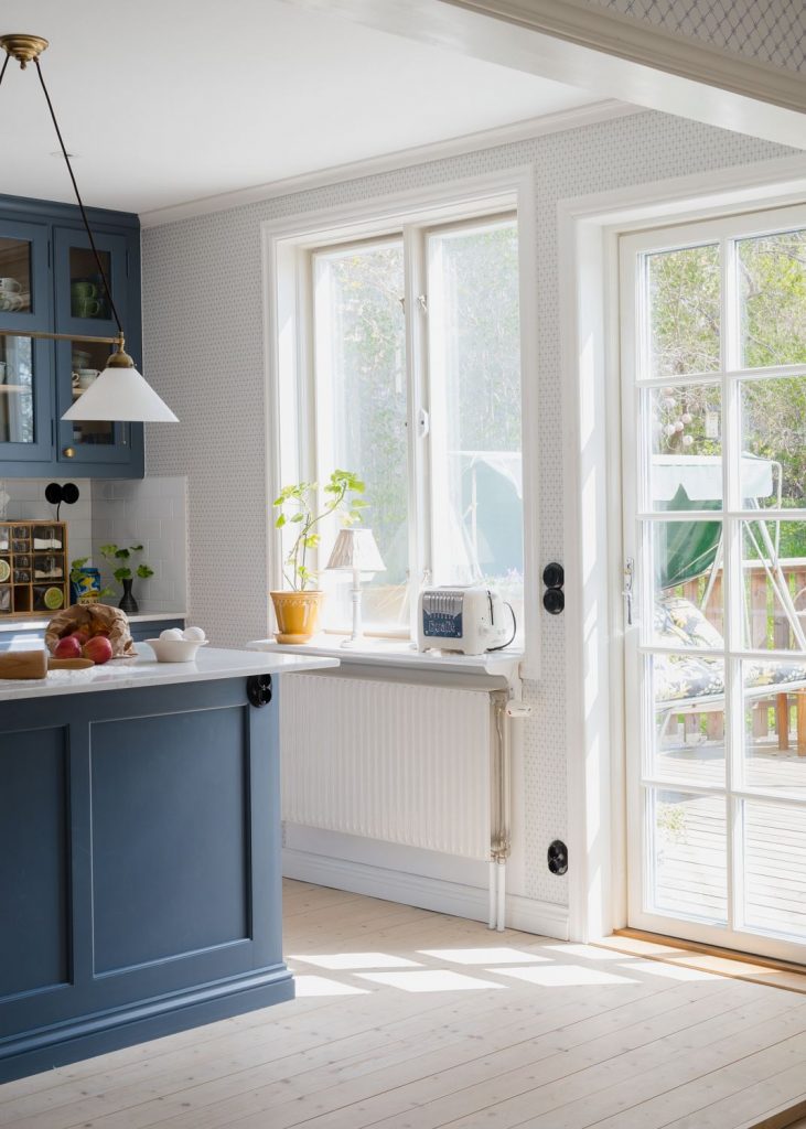 A happy Swedish home with black floors and bright colours